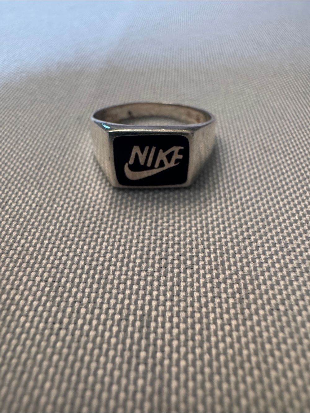 Taxco Silver Tone Ring with Black Enamel Logo